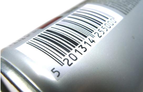 A barcode sticker on a metal item
